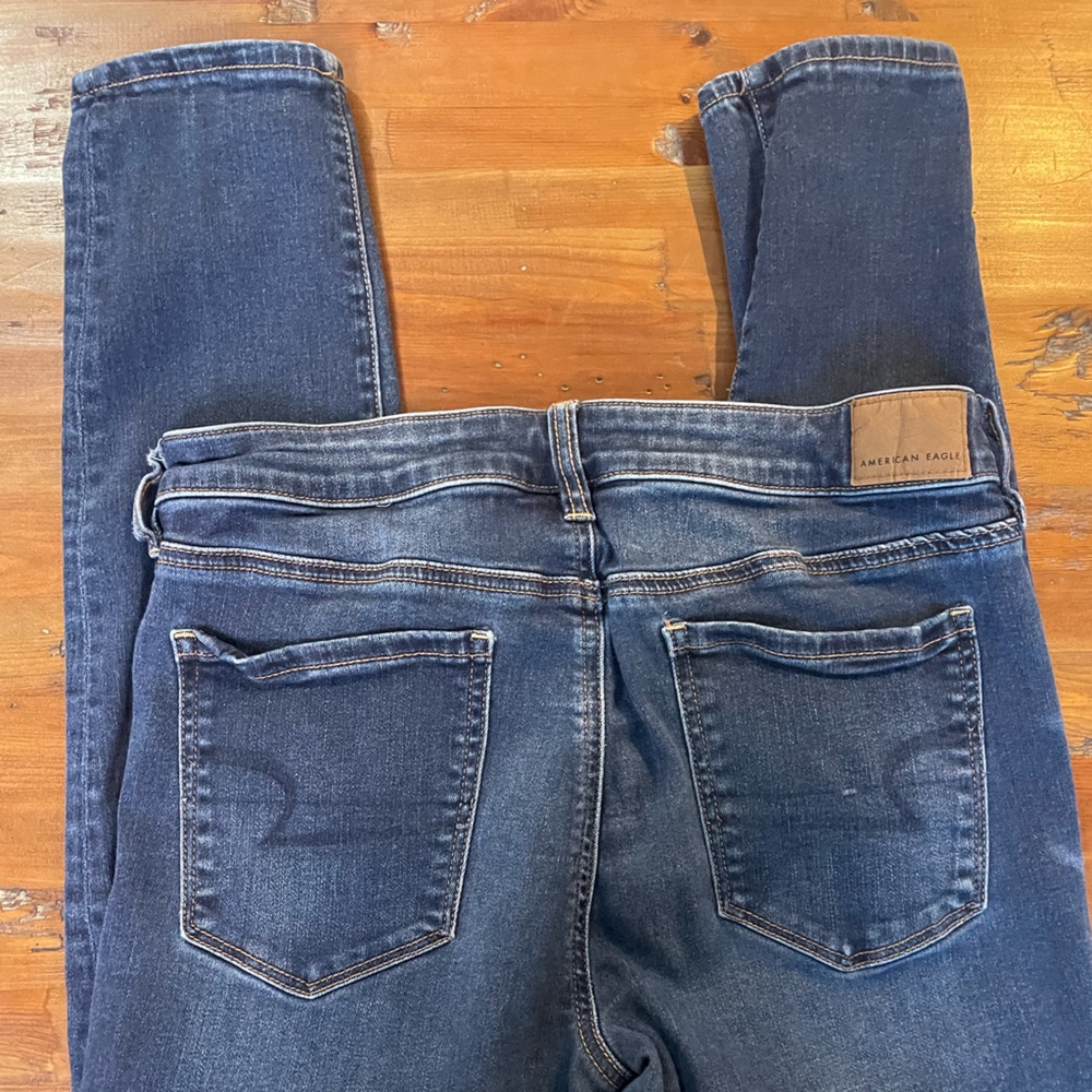 Women’s American Eagle Next Level Stretch Jeans distresses, size 12 Long.